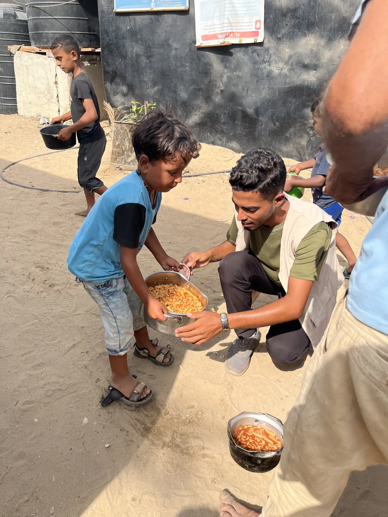 Child receiving a prepared meal